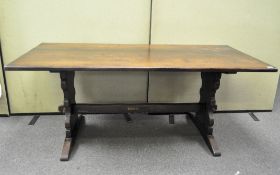 An early 20th century oak refectory table,