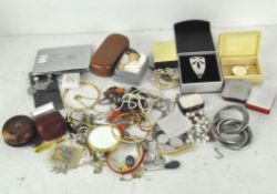 An assortment of costume jewellery, including bangles and cufflinks,