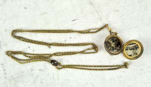 A gold plated Langaurd chain and circular locket