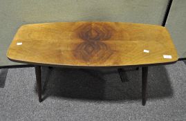 An Ercol-style coffee table of squared oval form,
