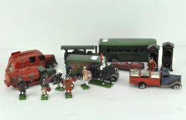 A Triang Minic truck, a clockwork steam tractor, a Minic Transport truck and other items