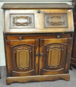 A contemporary oak bureau,