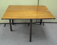 An early 20th century rectangular mahogany drop leaf table on square legs,