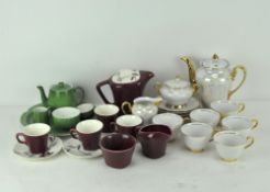 A tea service and two coffee services