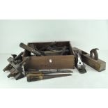 A collection of vintage handwork and woodwork tools,