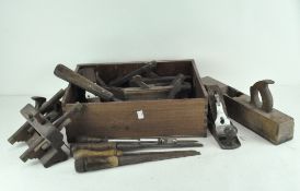 A collection of vintage handwork and woodwork tools,