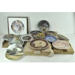 Fifteen Royal Doulton limited edition plates,