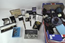 An extensive collection of assorted costume jewellery, to include brooches, rings,
