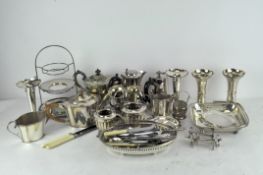 A large group of vintage and early 20th century silver plate including tea and coffee pots, vases,