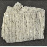 A modern hand woven Korinth cream and beige flecked rug, 65% wool, 35% jute.