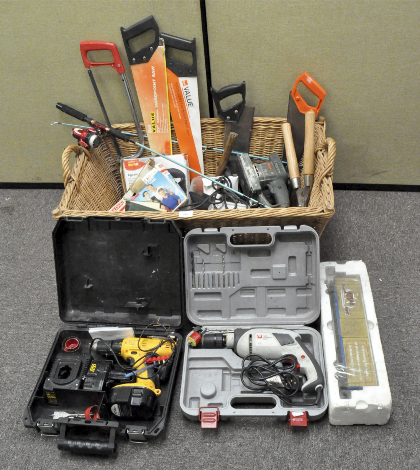A quantity of assorted tools including a cased hammer drill,