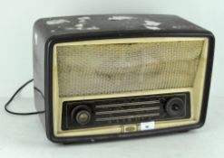 A vintage G E C valve radio, mid-century, with brown bakelite case,