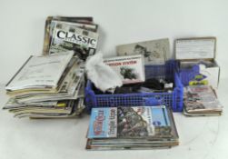 A collection of Motorcycle books and related maintenance ware