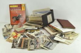 A box of assorted ephemera, letters and postcards, car and bike manuals,