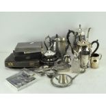 A collection of vintage silver plated ware including coffee pots, cups, goblets,
