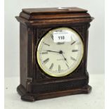 A vintage Hermle quartz mantle clock, the dial with Roman numerals denoting hours,