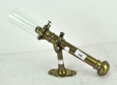 A vintage brass and glass ships gimbal oil lamp,