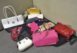 A collection of ladies handbags