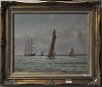 A 20th century gilt framed painting of boats and a tug, signed