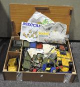 A collection of 1970's and 80's Meccano together with model books,