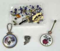 A selection of costume jewellery including earrings, brooches, a necklace,