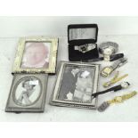 Three silver plated photo frames,