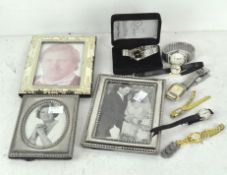 Three silver plated photo frames,