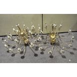 An 18 flame brass hanging chandelier, and another 12 flame example,