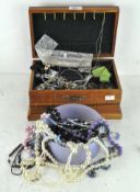 Assorted costume jewellery, to include chains, brooches, bangle and more,