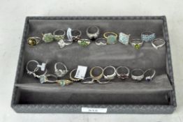 An assortment of 925 silver dress rings, of varying shapes and designs,