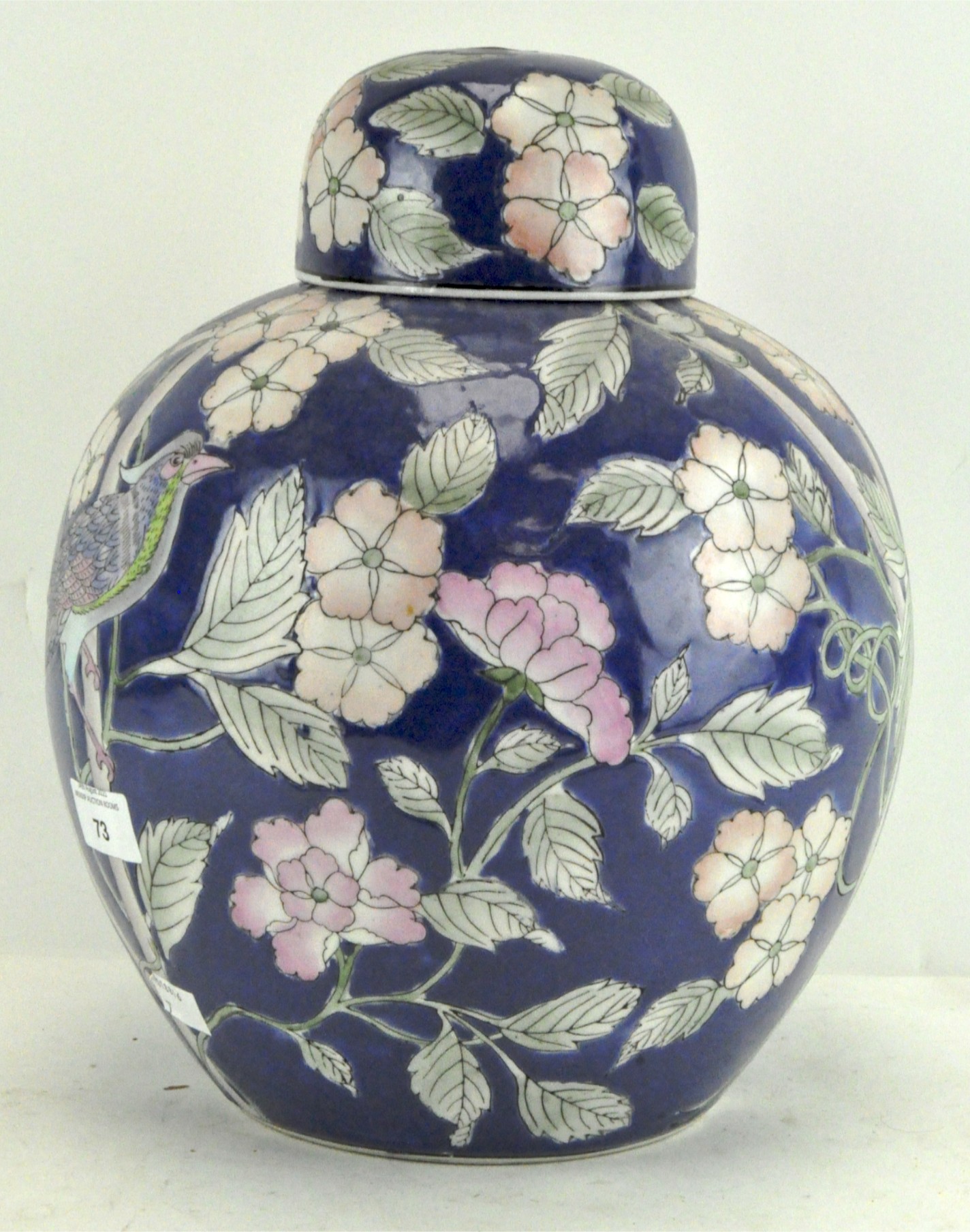 A 20th century Chinese porcelain oviform vase and domed cover,