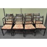 Eight Regency mahogany dining chairs on turned legs including two carvers,