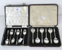 Two cased sets of silver apostle spoons,