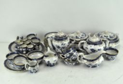 A vintage part blue and white with gilt breakfast service, Booths 'Real Old Willow',