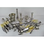 A collection of vintage and contemporary silver plated wares, flatware, silver spoons,