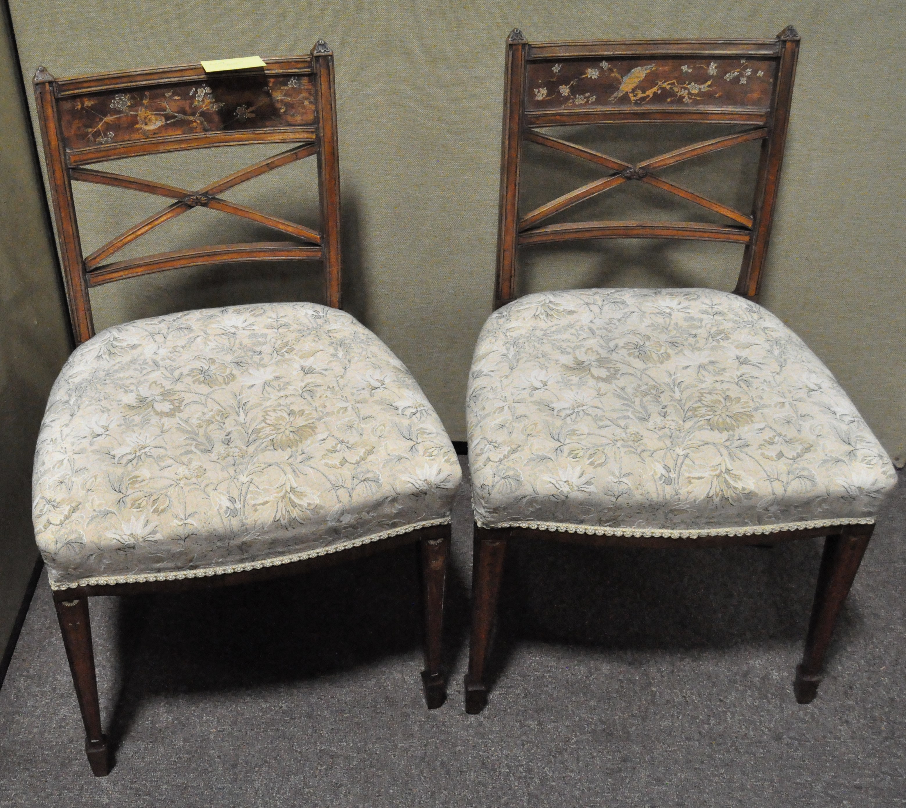 A pair of Regency mahogany dining chairs,