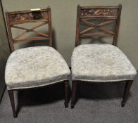 A pair of Regency mahogany dining chairs,