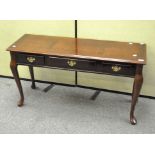 A modern console/hall table with the central drawer flanked by two false drawer fronts,