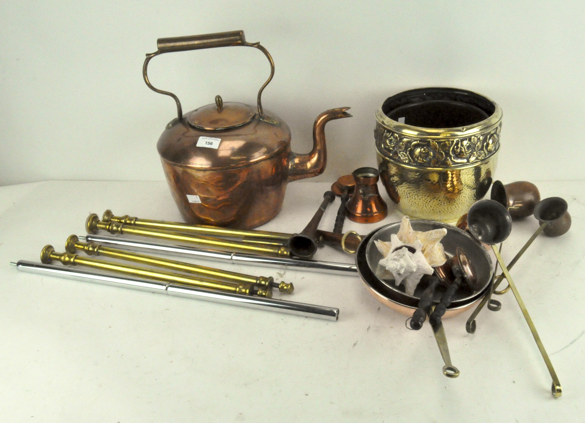 Assorted vintage copper and brassware including a large kettle, pans, pots and a set of whisky,