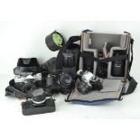 A collection of vintage camera and equipment, comprising: an Olympus OM10, assorted lenses,