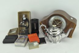 A selection of collectables, including: a Smiths wooden cased mantel clock,