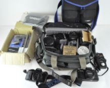 Assorted cameras, lenses and accessories including two camera bags,