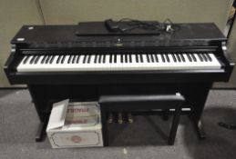 A Yamaha Arius YDp-163 keyboard with stool and a box of sheet music