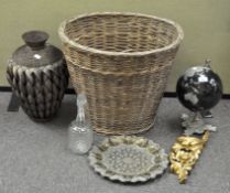 A large wicker basket, height 46cm, containing various collectables