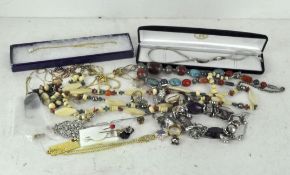 A quantity of costume jewellery including necklaces, bracelets,