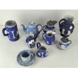 Nine pieces of mainly 20th century Wedgwood blue jasperware, including jugs and a coffee pot,