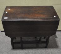 A late 19th century/early 20th century small oak table gateleg table