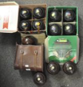 A collection of lawn bowls, to include a set by Taylor Rolph, Thomas Taylor and other makes,