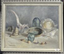 A 20th century oil on canvas, depicting a still life of shells and glassware,