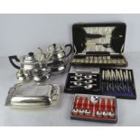 A selection of vintage silver plated wares including tea pots and various boxed flatware